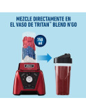 Licuadora Xpert Series roja con un vaso Blend N Go Oster BLST3B RPG 053